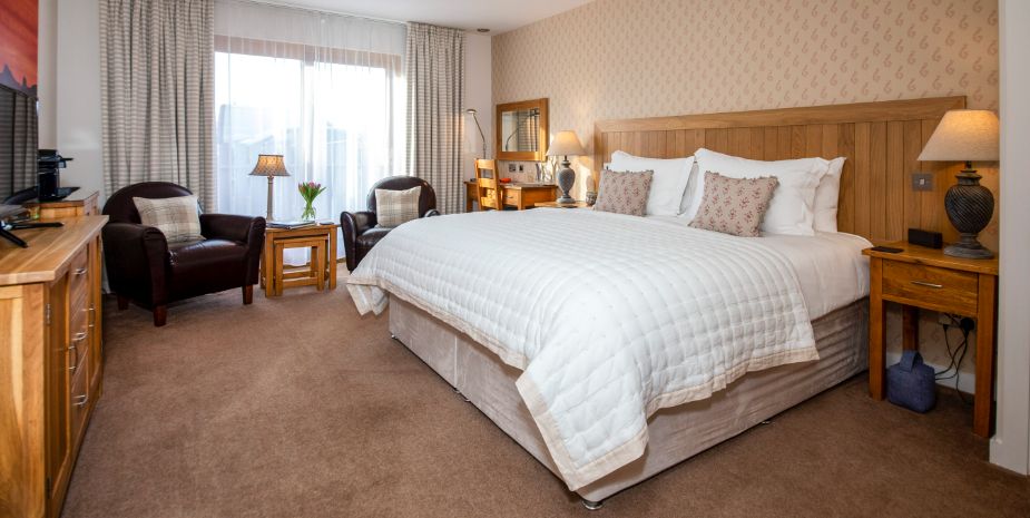 Broadbay House, Superking room with neutral decor and furniture.