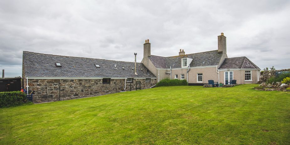Galson Farm Guesthouse exterior with large garden area.